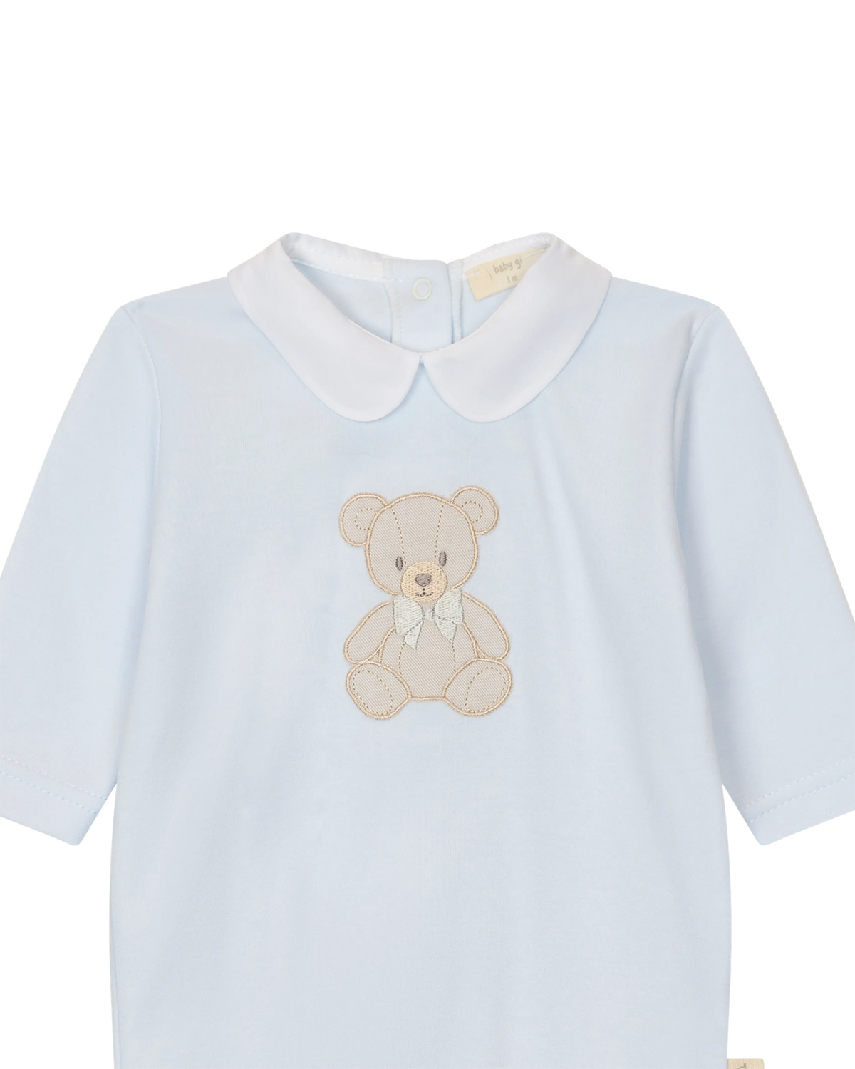 LilleLuxus Babygi blue interlock cotton baby romper featuring a cute embroidered teddy bear and a white Peter Pan collar