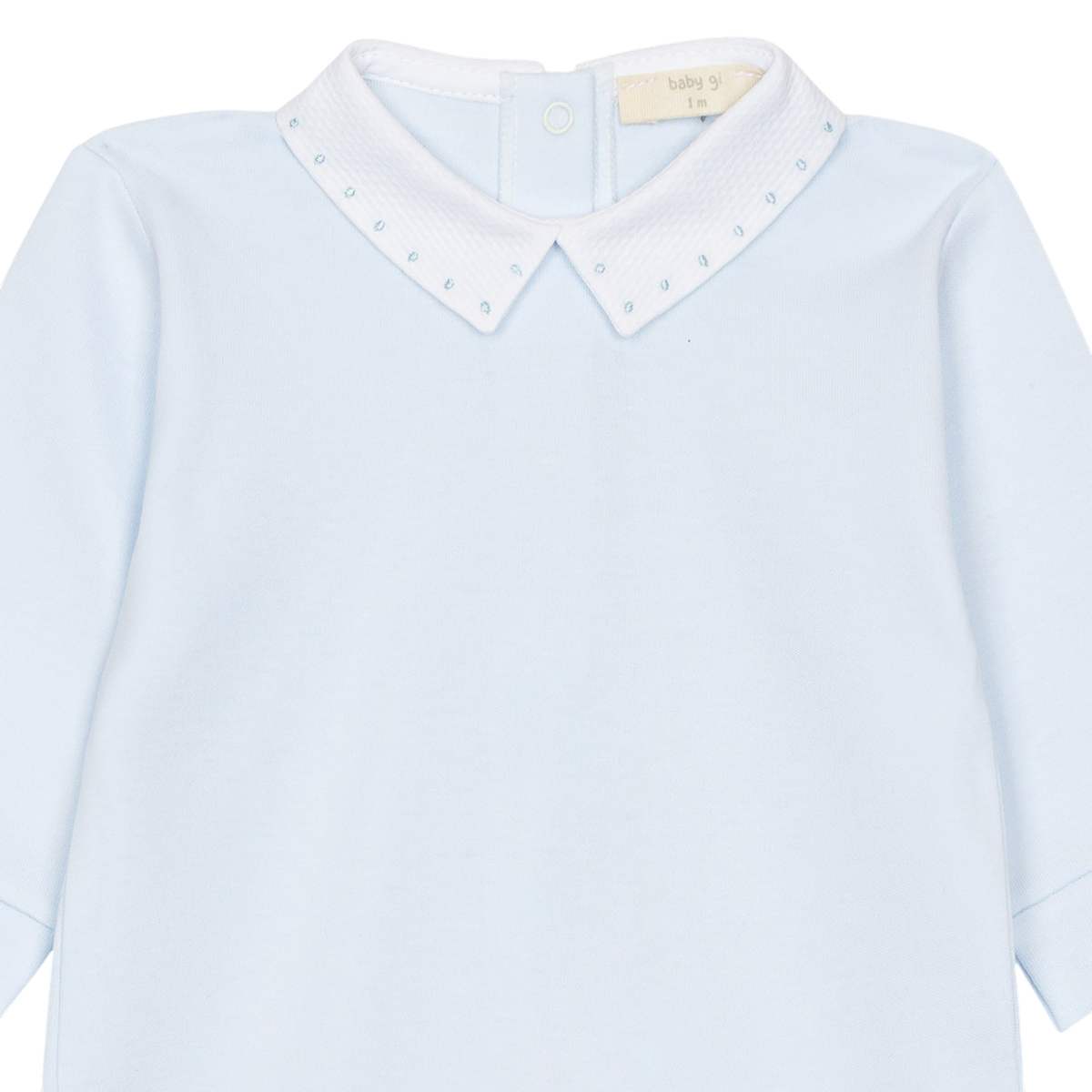 LilleLuxus Babygi light blue interlock cotton baby onesie with a white textured piqué collar and snap button closure.