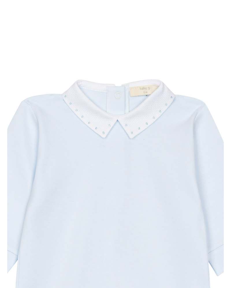 LilleLuxus Babygi light blue interlock cotton baby onesie with a white textured piqué collar and snap button closure.