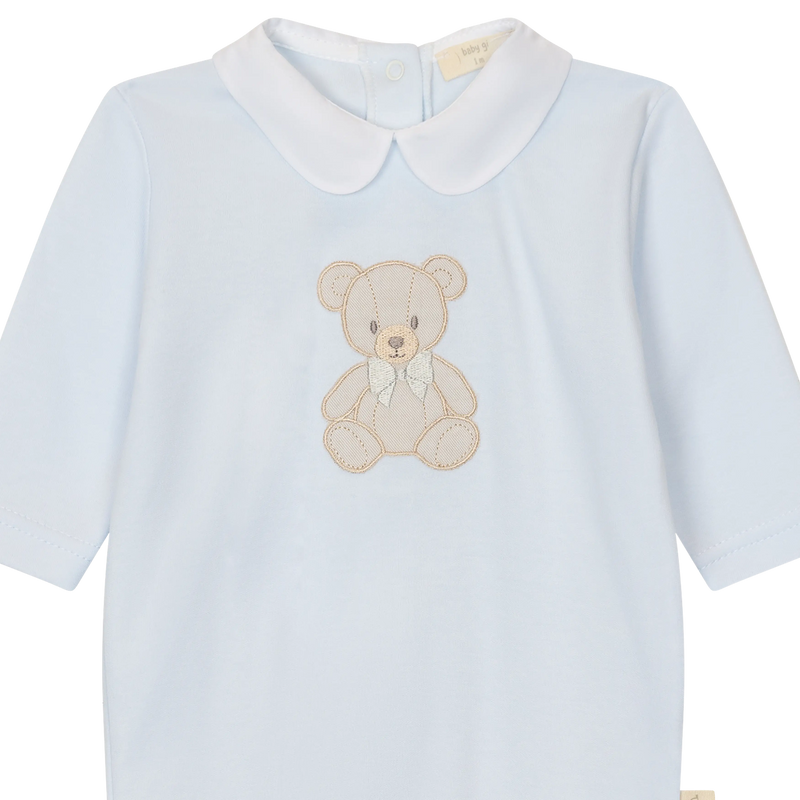 LilleLuxus Babygi blue interlock cotton baby romper featuring a cute embroidered teddy bear and a white Peter Pan collar