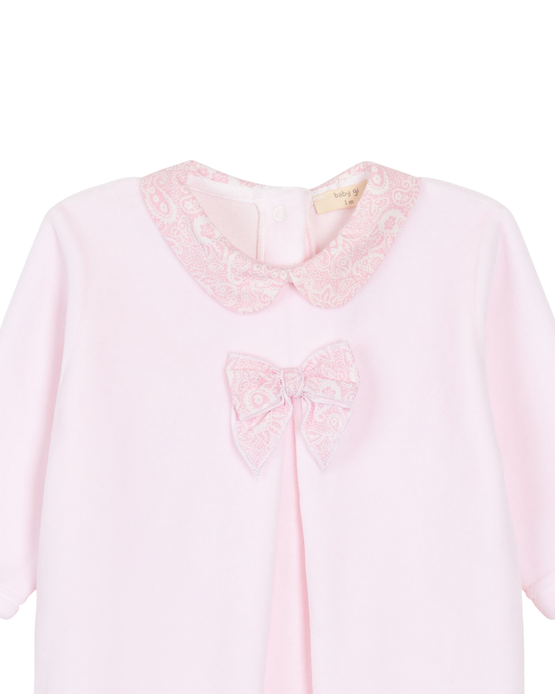 LilleLuxus Babygi Pixie Grove pink cotton blend baby onesie with a patterned Peter Pan collar and bow detail