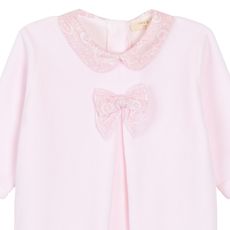 LilleLuxus Babygi Pixie Grove pink cotton blend baby onesie with a patterned Peter Pan collar and bow detail