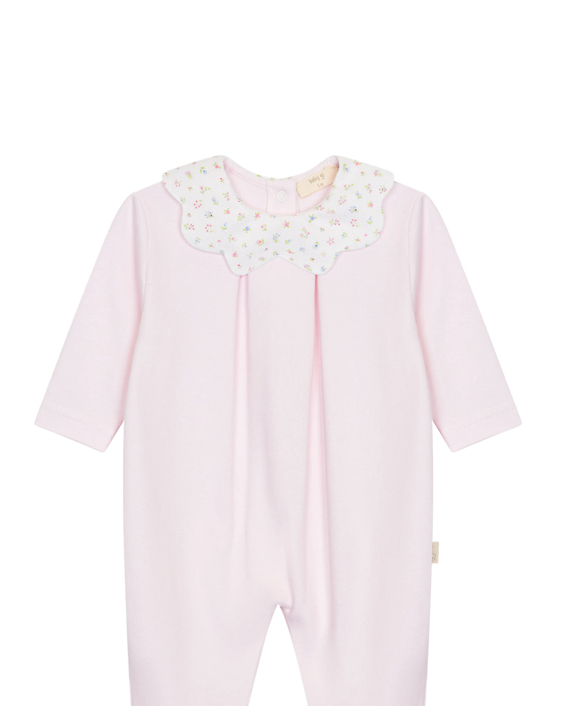 LilleLuxus Babygi pink interlock cotton baby romper with a floral scalloped collar and long sleeves.